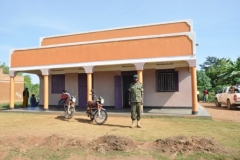 WO2-Obonyo-Fred-in-front-of-his-house-built-using-WSACCO-Nyumba-loans-in-Lakwa-Village-Patong-Town-Council-Agago-District