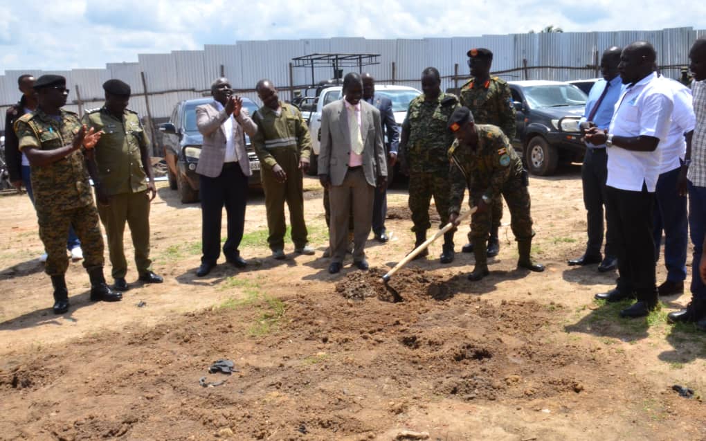 One of the UPDF officerthe 409 brigade commander Lt.Col Nathan Bainomugisha breaking the ground for WSACCO